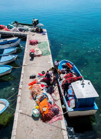 pier with fishermen boats near Gallipoli, salento, south Italyのeditorial素材