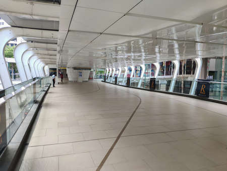 Ratchaprasong Skywalk Between Chidlom BTS Skytrain Station and Central World shopping mall without people during the pandemic Covid-19, Bangkok, Thailandのeditorial素材