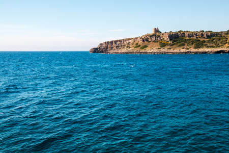 Watchtower near ionian sea (Uluzzo tower in Porto Selvaggio) Apulia, Salento, Italyの写真素材