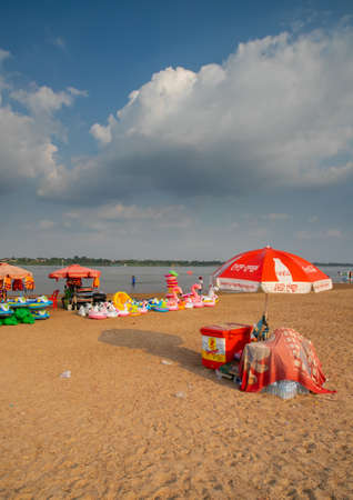 beach umbrella on Koh Pen (Koh Paen), a nice island located in the middle of Mekong river, just off the shore of provincial town of Kampong Cham, Cambodiaのeditorial素材