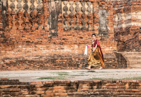 Photoshoot near Wat Chaiwatthanaram temple in Ayutthaya Historical Park, Thailandのeditorial素材