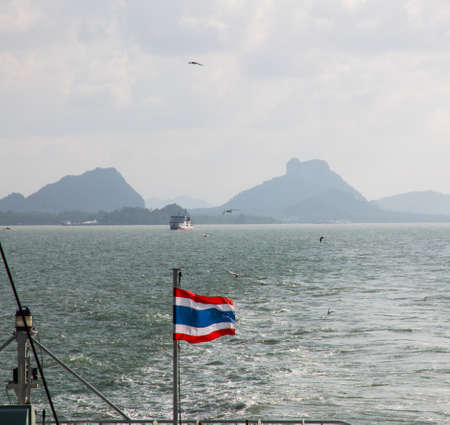 Ferry boat with thai flag to Koh Samui island, seascape, Thailandの写真素材
