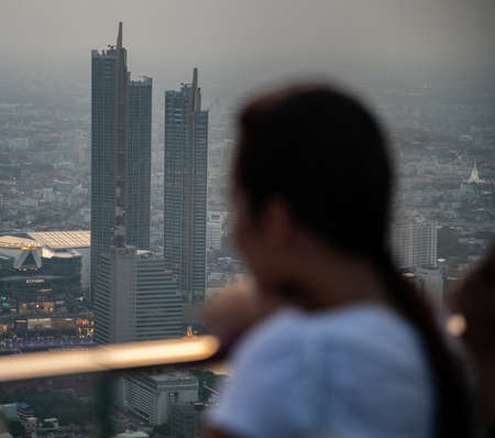 blurry girl on Mahanakhon building, Bangkok, Thailandのeditorial素材