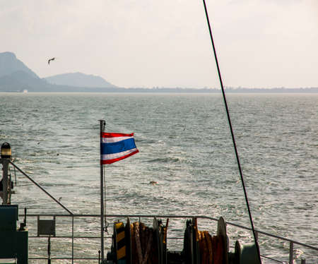 Ferry boat with thai flag to Koh Samui island, seascape, Thailandの写真素材