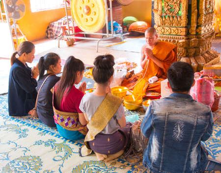 Faithful inside Wat Si Muang temple in Vientianeのeditorial素材