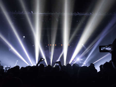Concert crowd inside a music festival hallの写真素材