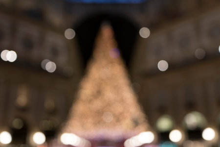 Blurred Christmas tree shot in Milan at night, no one is visible.の写真素材