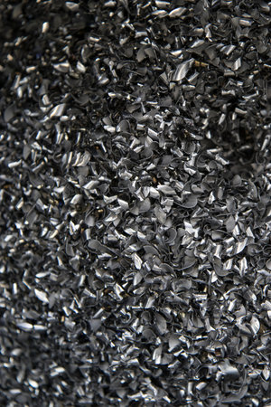 Close up on metal particles, waste from industrial production lines