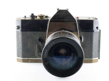 Close up on a vintage film camera, resting on white background.の写真素材