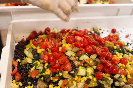 Close up on a fresh healthy summer salad resting on a table top, no people are visible.
