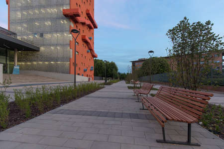 Milan, Italy - May 6, 2020: sreet view of a desert city at sunset, the coronavirus lockdown has just ended but the streets are empty. Shot with a wide angle lens.のeditorial素材