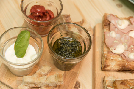 Close up on traditional happy hour appetizers from the italian tradition.
