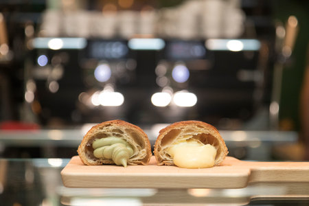 Close up on industrial croissants on a bar table top.