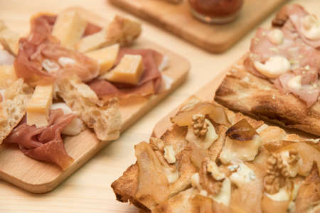 Close up on traditional happy hour appetizers from the italian tradition.の写真素材
