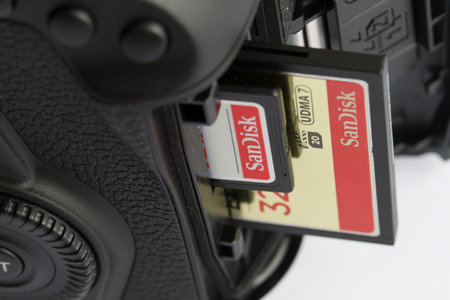 Milan, Italy - 17 June 2020: macro shot of professional compact flash card and SD card in a...
