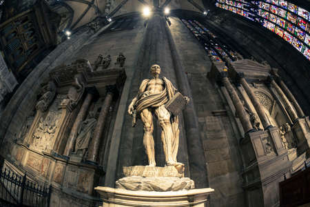 Milan, Italy - August 3, 2017: interior wide angle shot of the Milan cathedral, high pillars sustaining the vault are visible.のeditorial素材