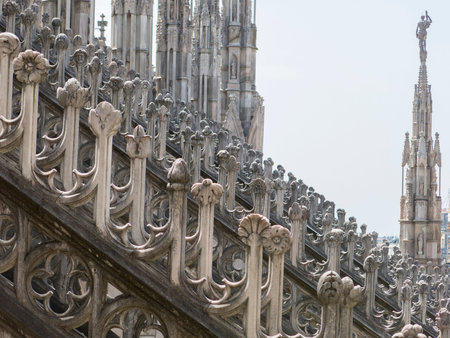 Milan, Italy - August 3, 2017: wide angle view of the rooftop of Duomo di Milano, background is a blue sky in full daylight.のeditorial素材