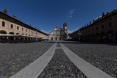Vigevano, Italy - August 30, 2020: street view of the medieval main square in Vigevano during...
