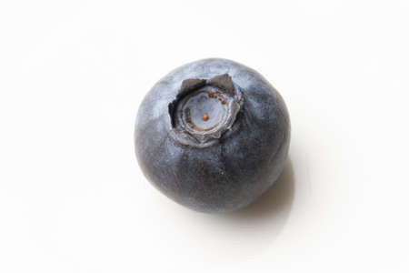 Macro shot of blueberries isolated on white backgroundの写真素材