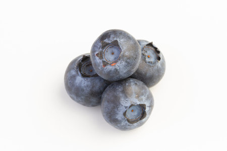 Macro shot of blueberries isolated on white backgroundの写真素材