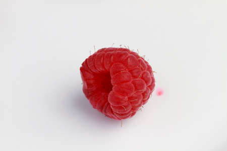 Close up on raspberries isolated on white backgroundの写真素材