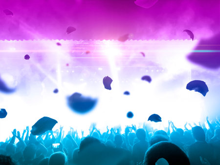 Large gathering of people in front of a lit stage