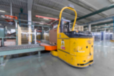 Blurred image showing the interior or a production facility, no people are visible.の写真素材
