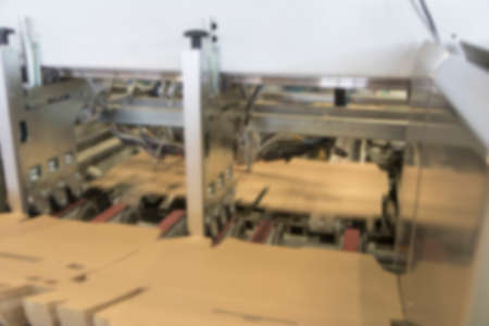 Blurred image showing the interior or a production facility, no people are visible.の写真素材
