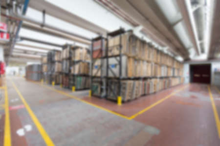 Blurred image showing the interior or a production facility, no people are visible.の写真素材