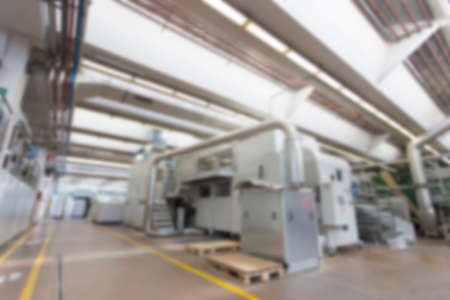 Blurred image showing the interior or a production facility, no people are visible.の写真素材
