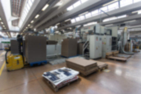 Blurred image showing the interior or a production facility, no people are visible.の写真素材