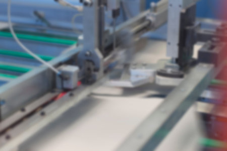 Blurred image showing the interior or a production facility, no people are visible.の写真素材