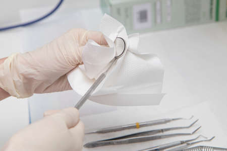 Close up detail of dentist work tools, no people are visible.の写真素材