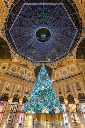 Milan, Italy - December 7, 2021: night street view of Milan with Christmas decorations in Piazza del Duomo.のeditorial素材