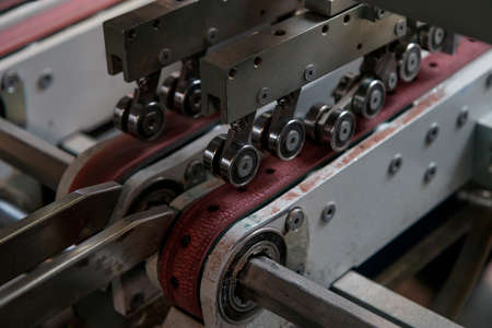 Industrial machinery at work inside a facilityの写真素材