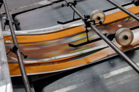 Industrial machinery at work inside a facilityの写真素材