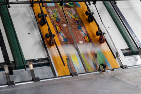 Industrial machinery at work inside a facilityの写真素材