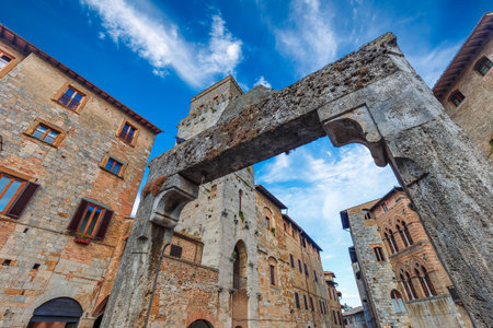 San Gimignano, Italy - August 19, 2021: panoramic view shot in a bright and sunny day in San Gimignano, Tuscany. No people are visible.のeditorial素材