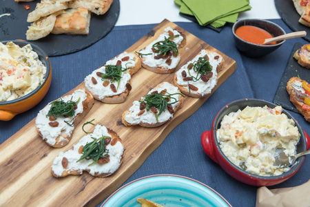 Close up on spanish tapas from a restaurant buffet dinner.の写真素材