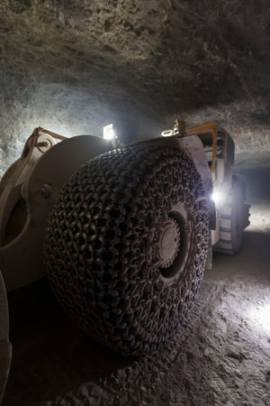 Inside a dark quarry mining plant, no people are visible.の写真素材