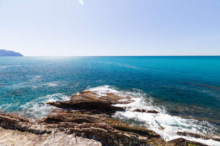 Nervi, Italy - April 10, 2022: seaside landscape on the Passeggiata di Nervi, Genova, during a sunny day.の写真素材