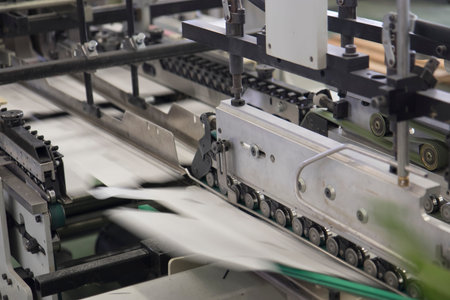 Production line of the plastic bottle on the conveyor belt. Industrial background