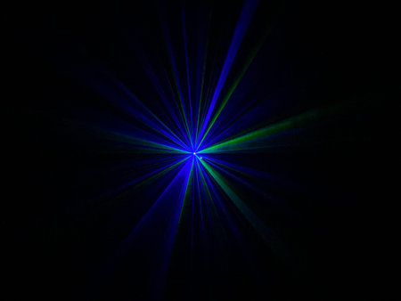 Colorful laser light beam photographic effect on black background. Nobody is visible.