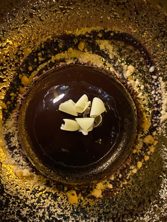 Chocolate cake with buttercream in a glass bowlの写真素材