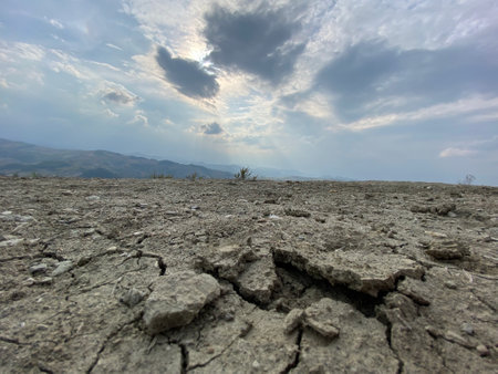 Dry cracked earth background. Global warming and climate change concept.の写真素材