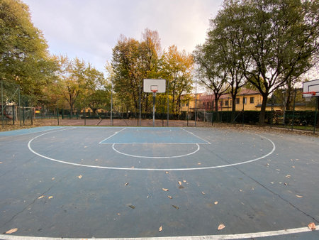 Basketball court in the center of the city in the evening.の写真素材