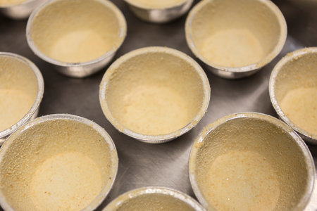 Close up of baking forms for muffins in a pastry shop.の写真素材