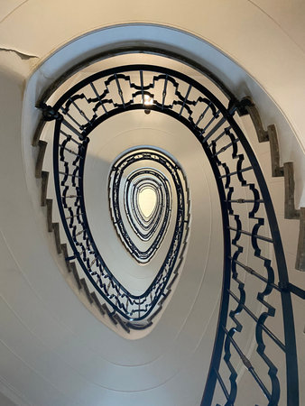 Spiral staircase in an old house, Lisbon, Portugal.
