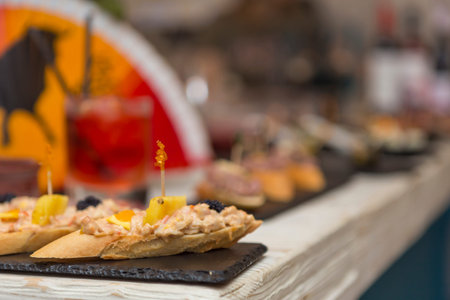 Close up on spanish tapas starters served on a table top. No people are visible.の写真素材