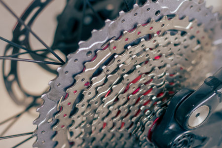 Close up on bike and bicycle wheels repair tools, background is blurred.